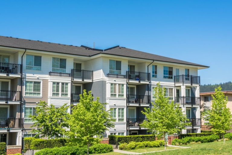 apartment complex with dark asphalt shingle roof, Maple Grove