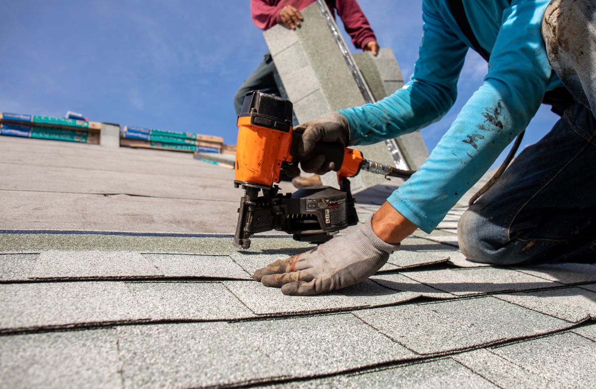 roofer installing roof shingles, Maple Grove, MN